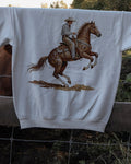 THE RHINESTONE COWBOY