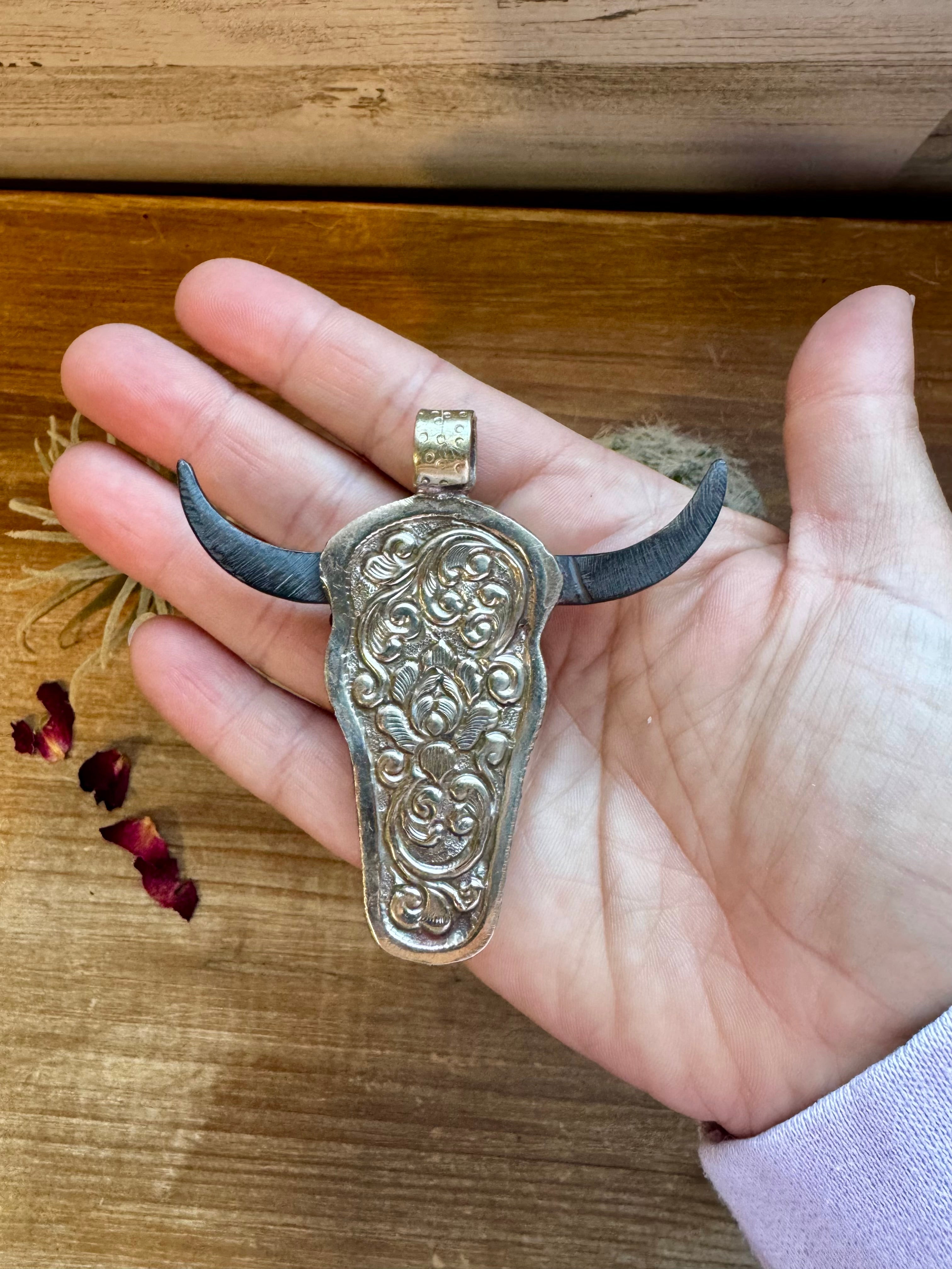 Big Antler longhorn with  turquoise pendant II
