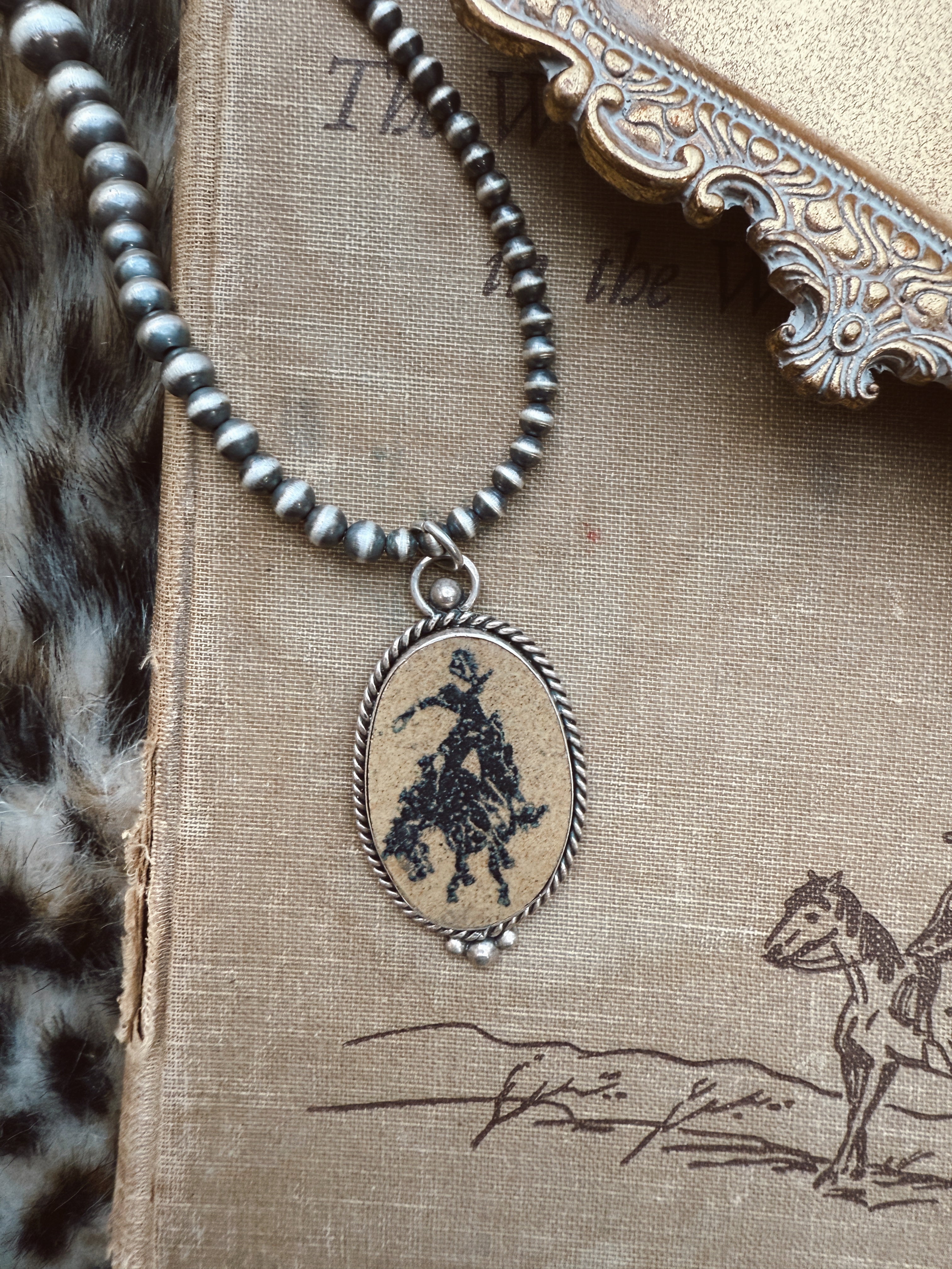 The Broncin pendant