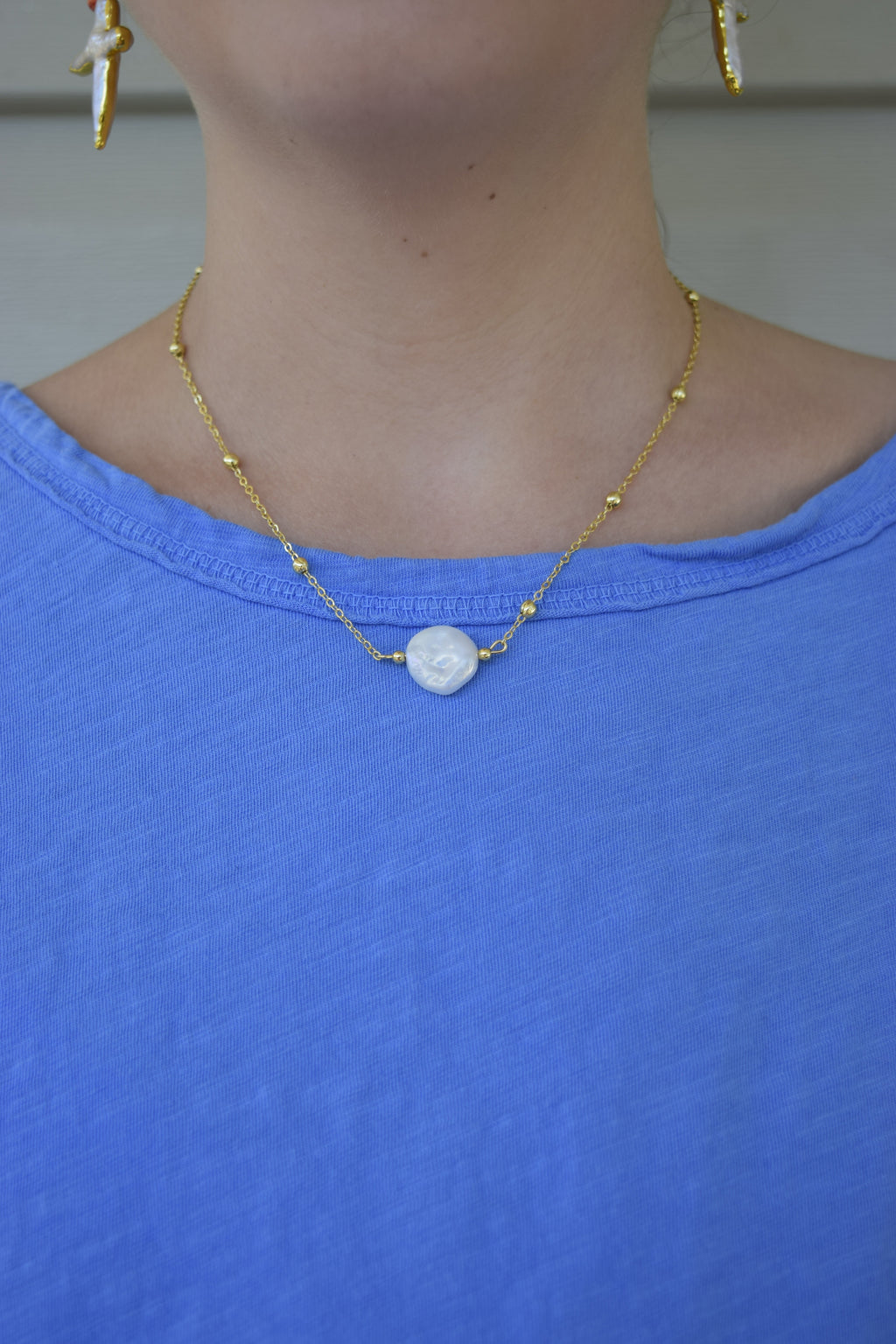 Your a pearl necklace in gold