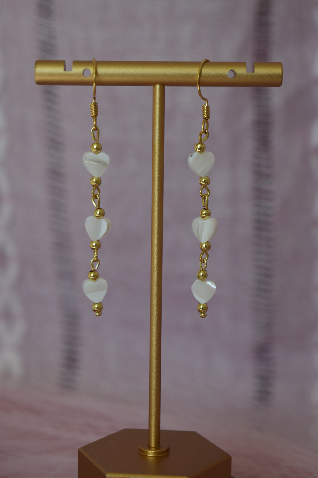 Falling for you dangles in gold