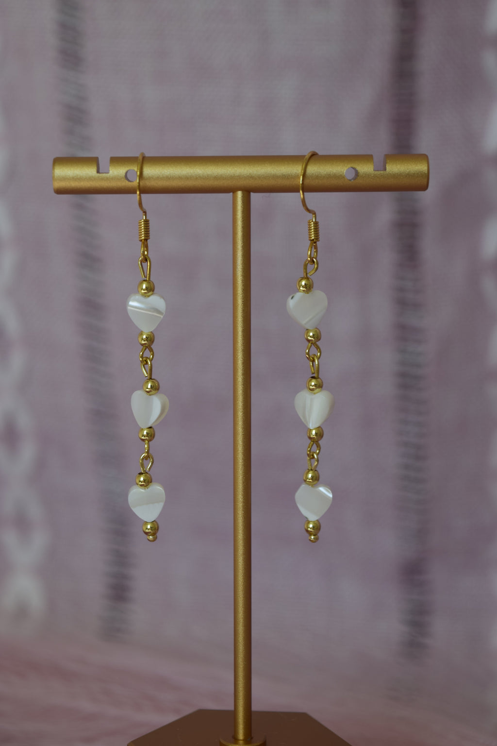 Falling for you dangles in gold