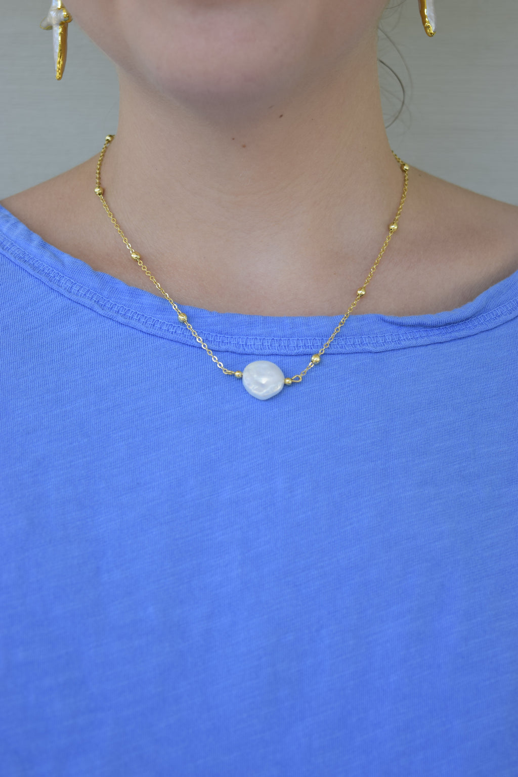 Your a pearl necklace in gold