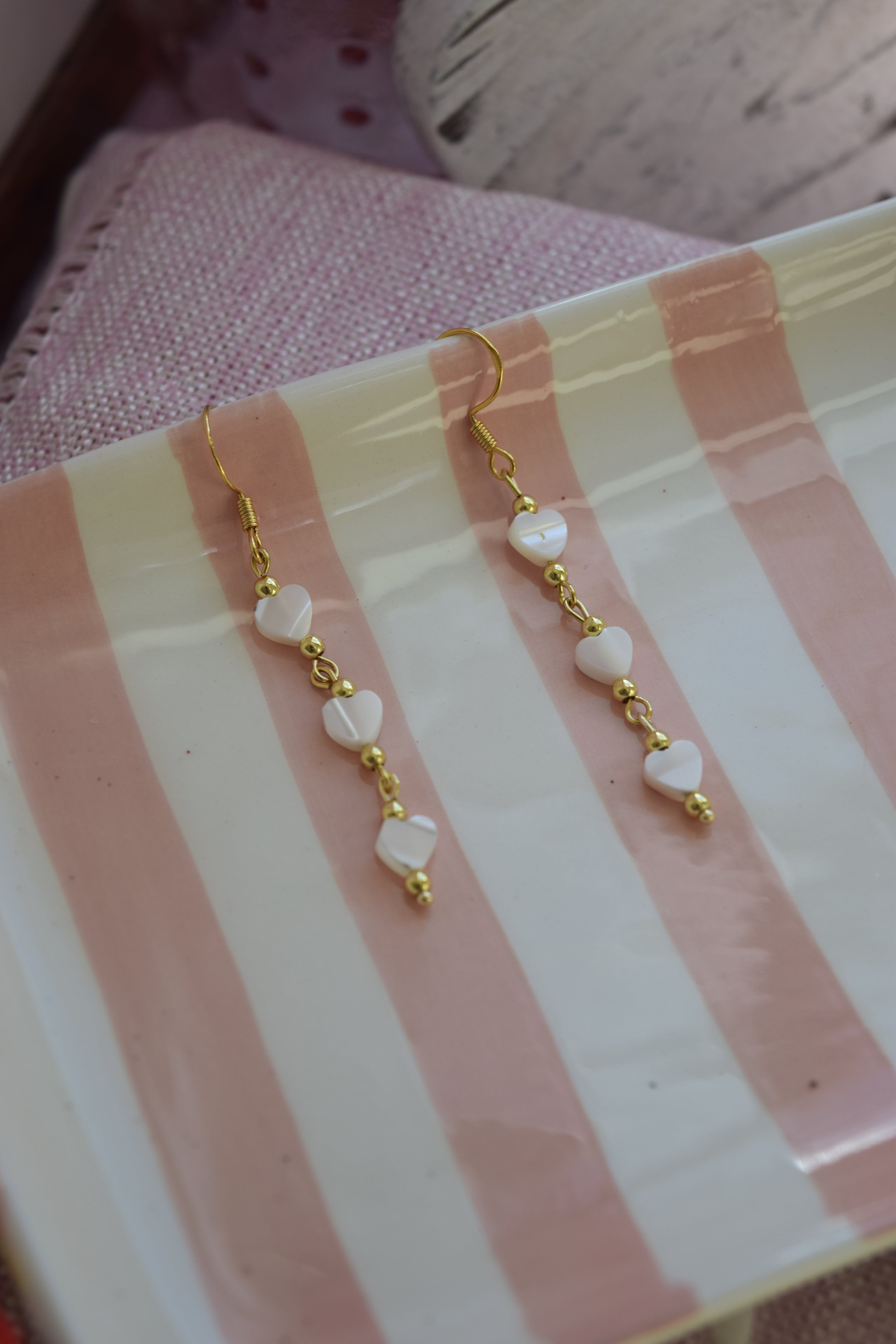 Falling for you dangles in gold
