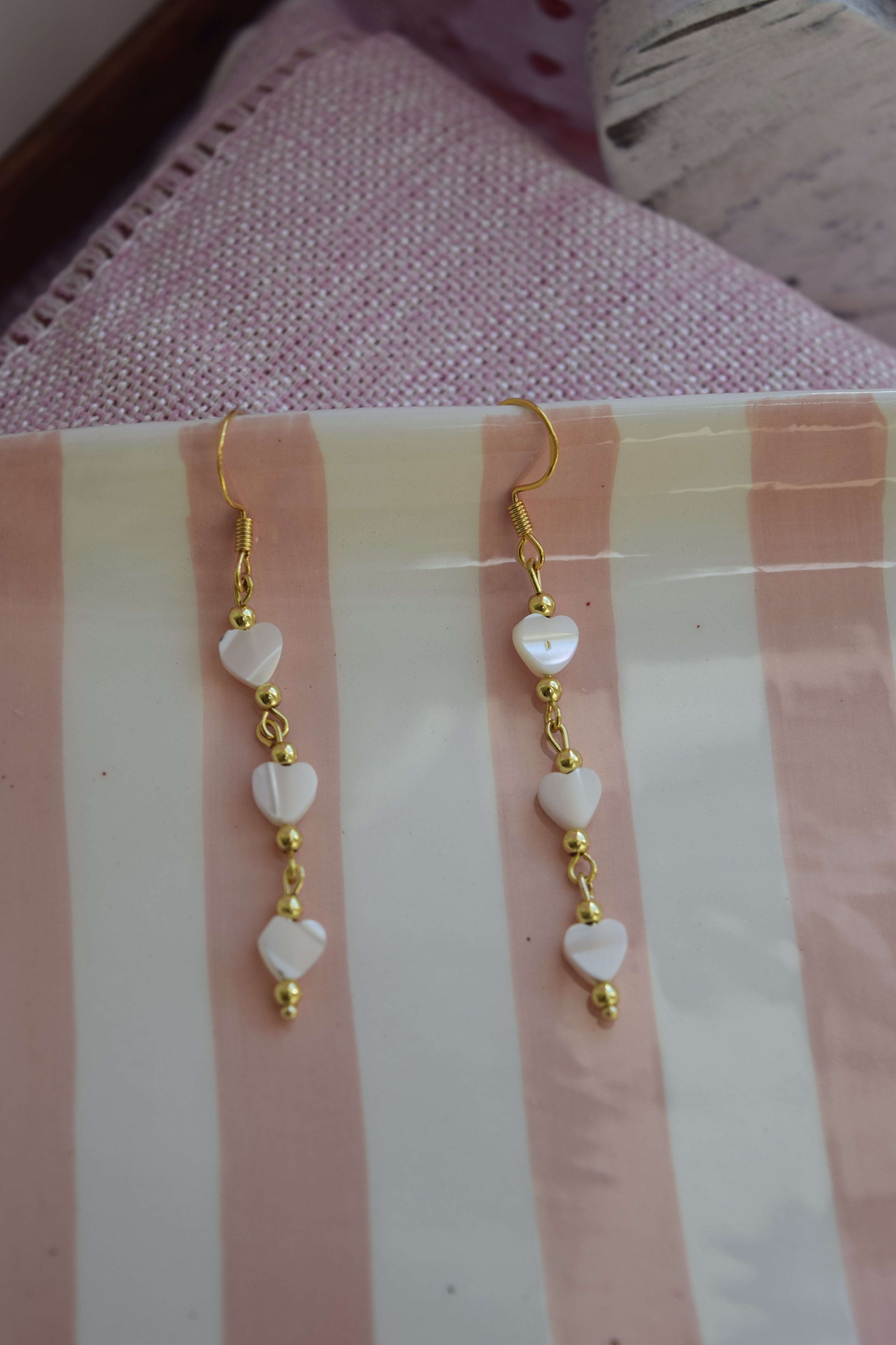 Falling for you dangles in gold
