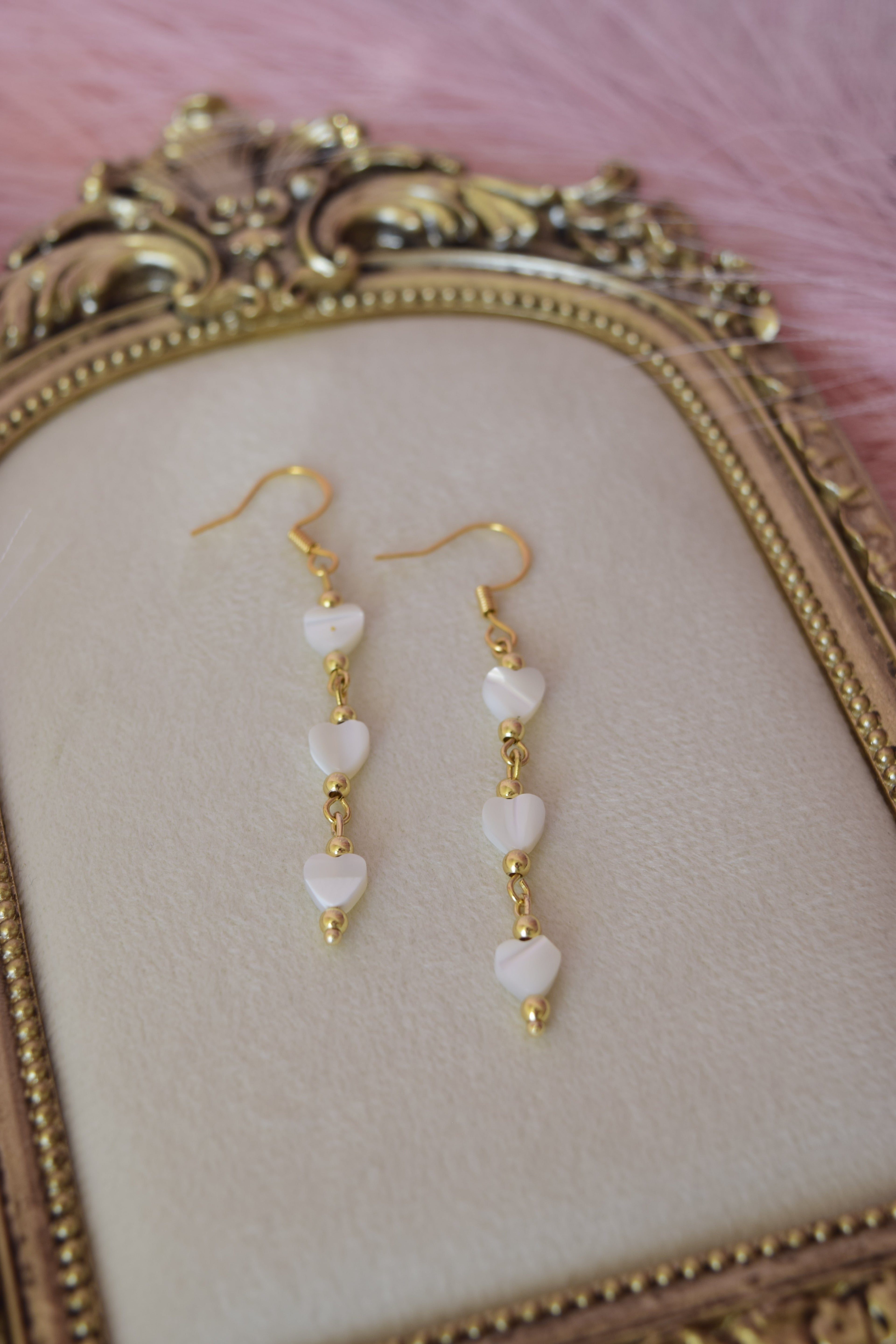Falling for you dangles in gold