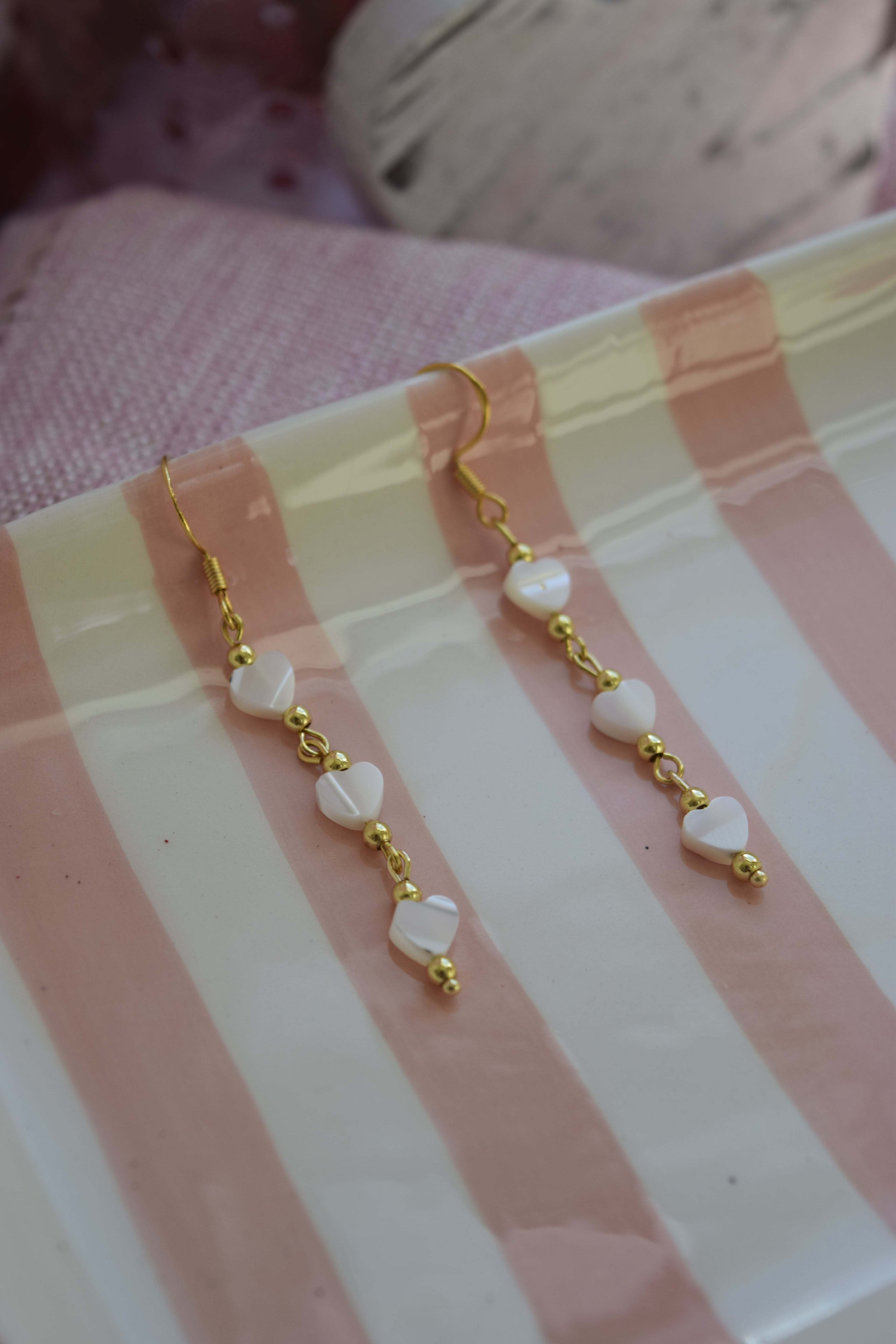 Falling for you dangles in gold