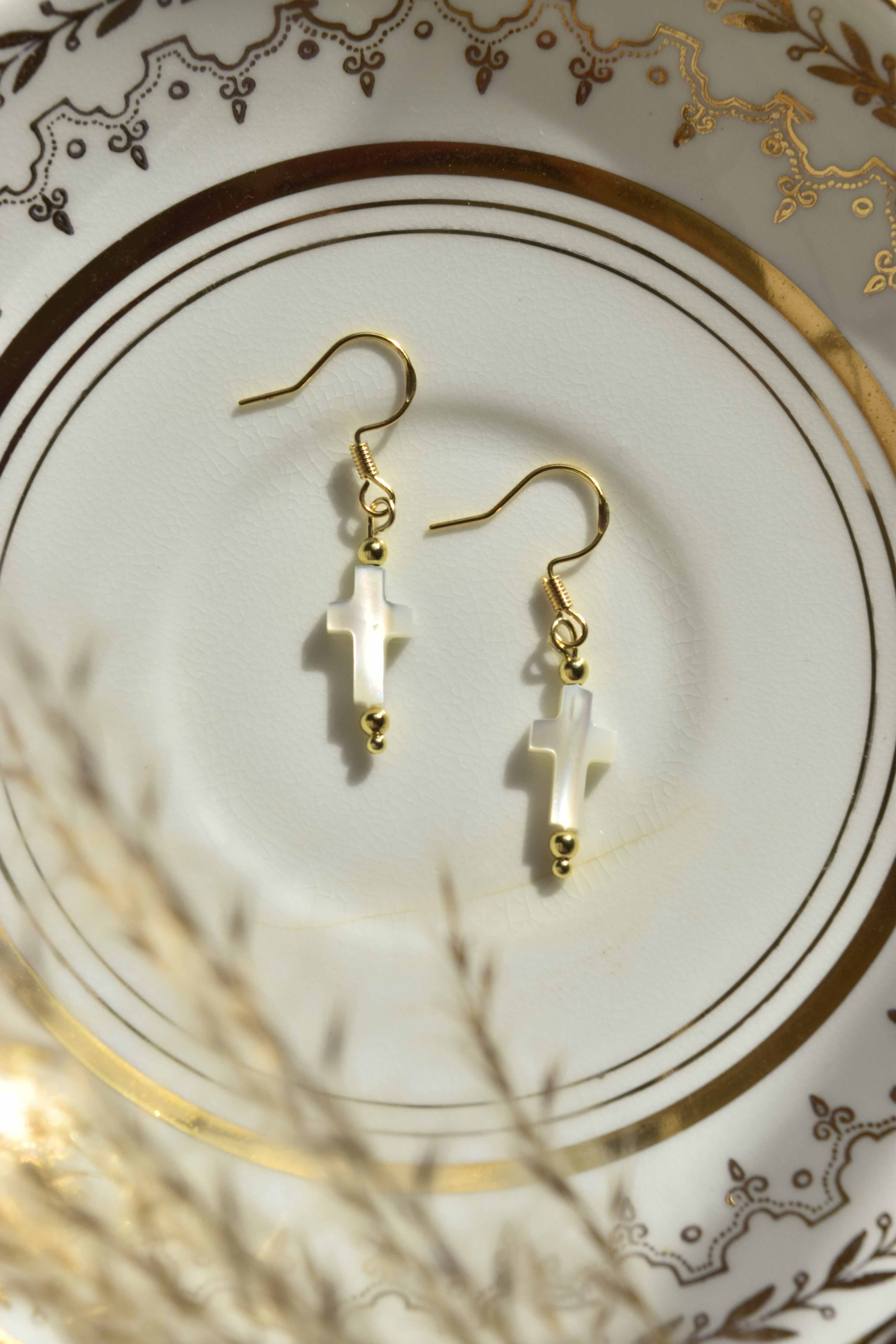 By His Grace- Dainty Cross Dangles in Gold