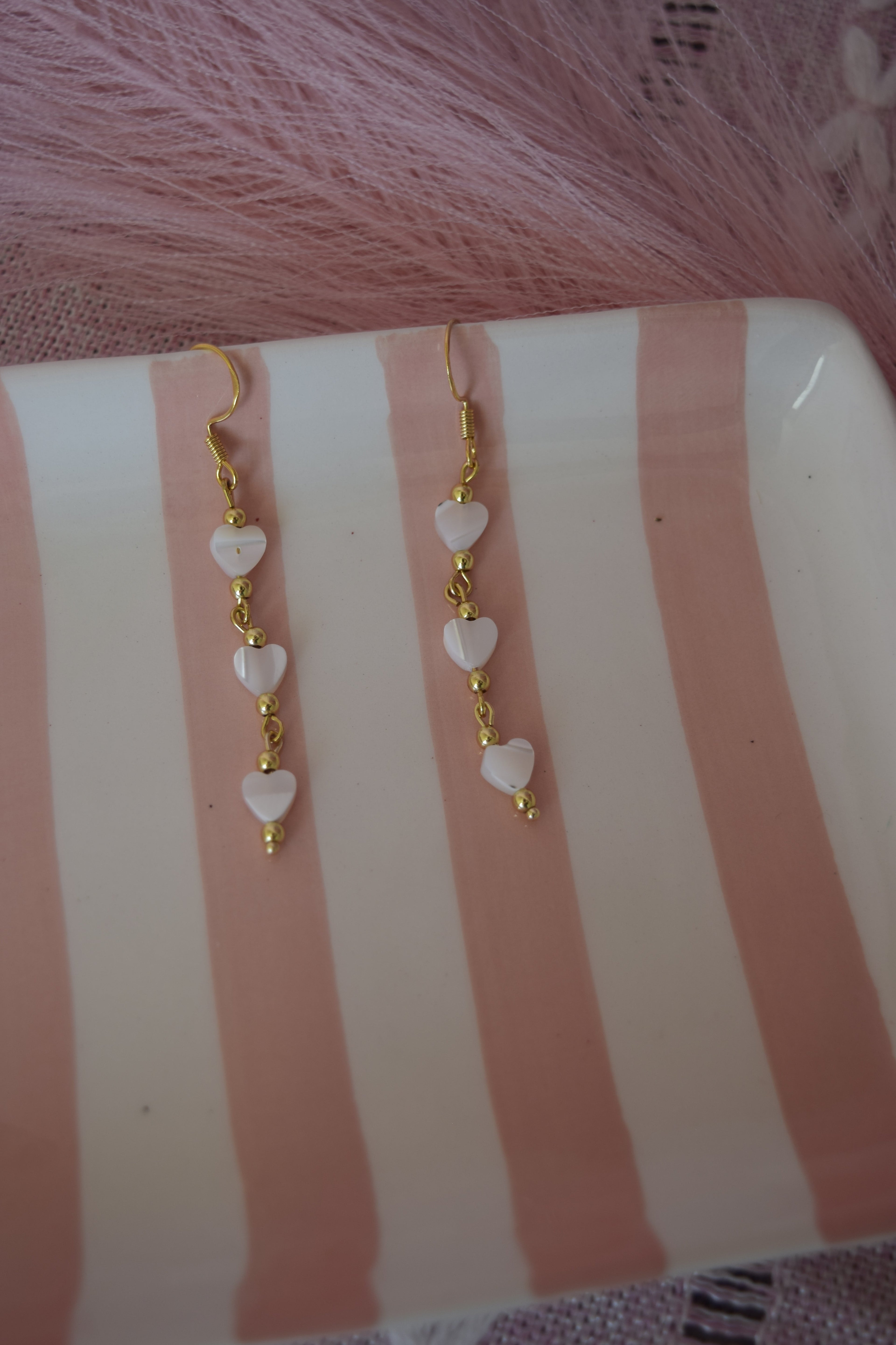 Falling for you dangles in gold